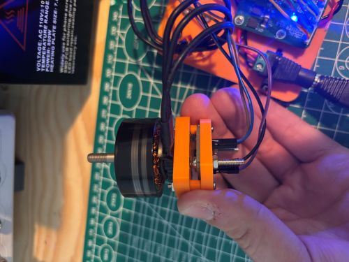 The BLDC motor in motion from the DRV8304 PCB with its 3D printed encoder mount.