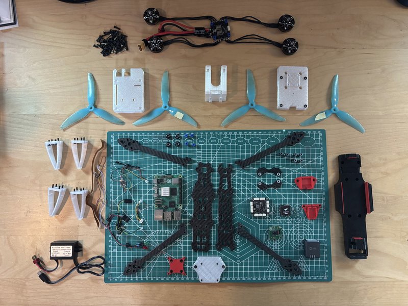 A photo of the components of the drone on a desk.